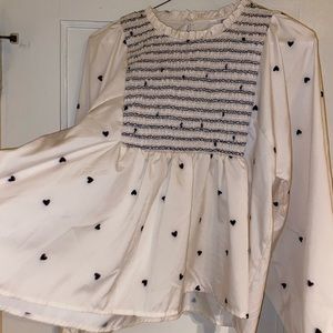 Blouse with poofy arms and heart pattern